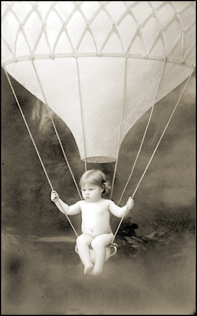 Vintage,Photo,Of,Child,Riding,In,Hot,Air,Balloon