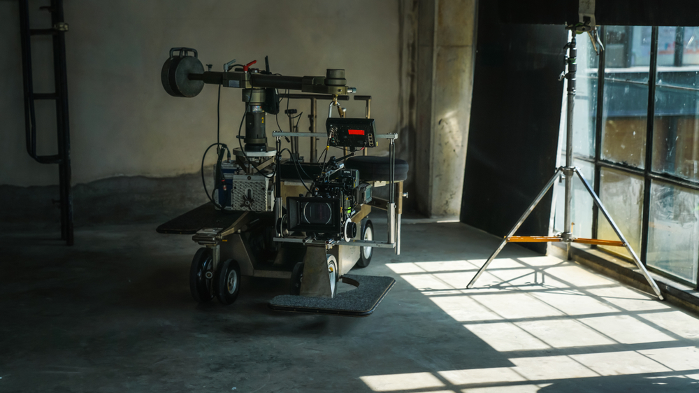 Camera,On,A,Dolly,In,The,Studio,As,Sun,Creates